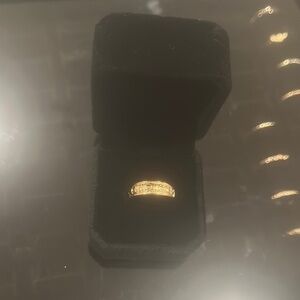 Elegant Gold Ring with Diamond Accents